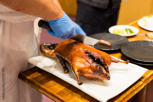 Chef prepare the peking duck in restaurant