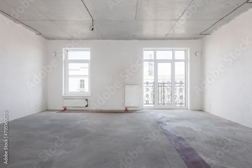 interior of the apartment without decoration in gray colors. rough finish