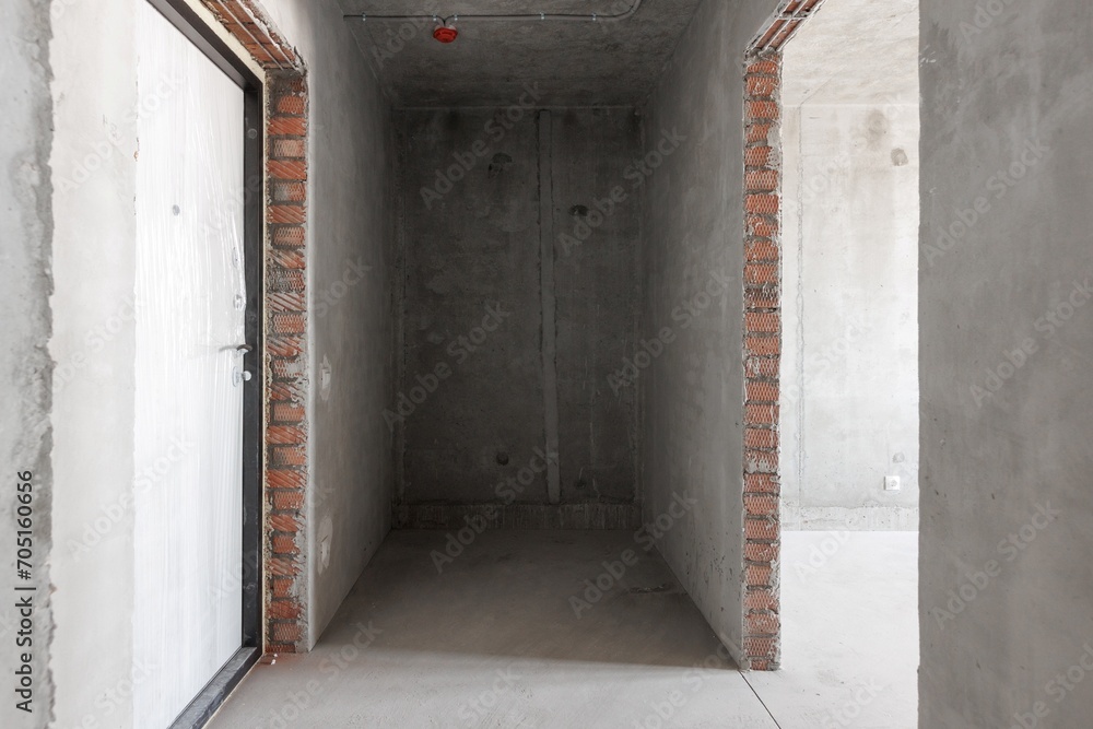 interior of the apartment without decoration in gray colors. rough finish interior of the apartment without decoration in gray colors. rough finish