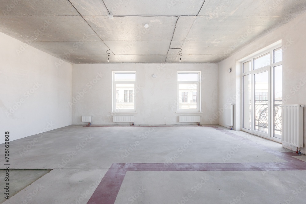 interior of the apartment without decoration in gray colors. rough finish interior of the apartment without decoration in gray colors. rough finish