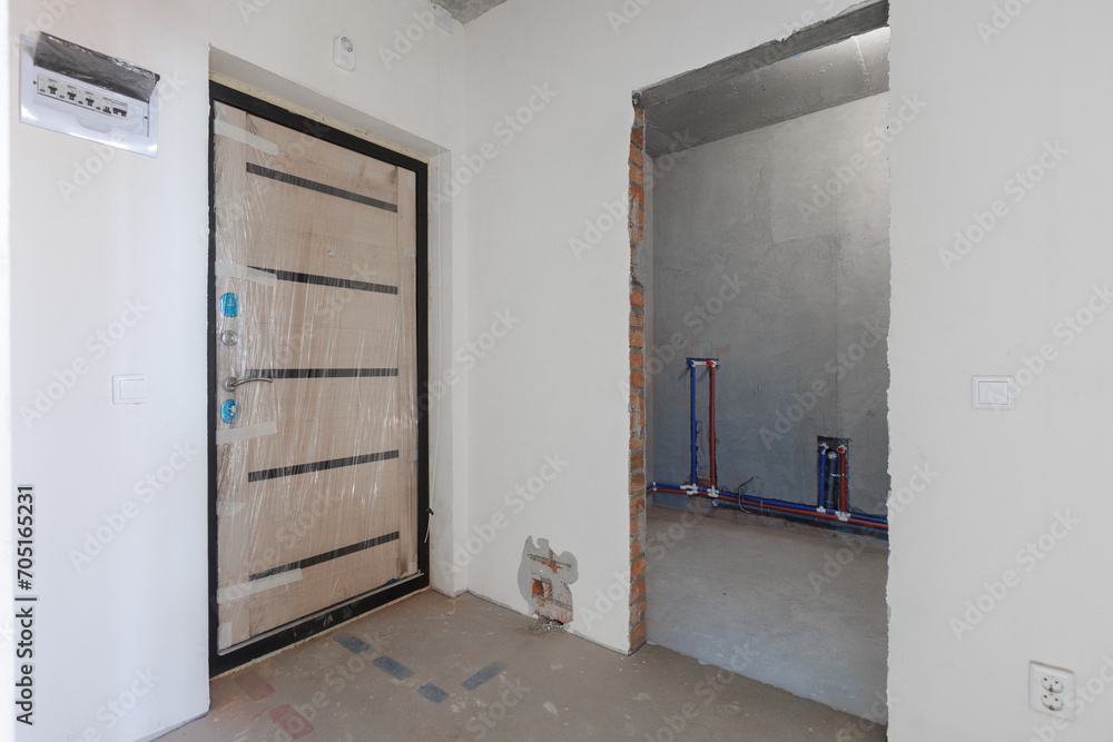 interior of the apartment without decoration in gray colors. rough finish interior of the apartment without decoration in gray colors. rough finish