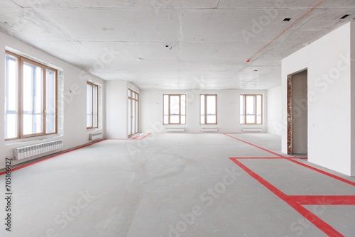 interior of the apartment without decoration in gray colors. rough finish