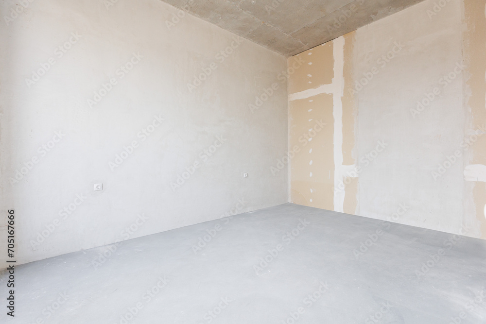 interior of the apartment without decoration in gray colors. rough finish interior of the apartment without decoration in gray colors. rough finish
