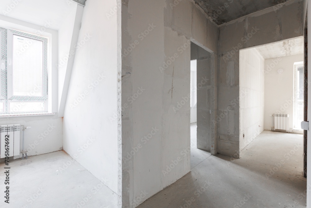 interior of the apartment without decoration in gray colors. rough finish interior of the apartment without decoration in gray colors. rough finish