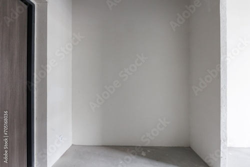 interior of the apartment without decoration in gray colors. rough finish