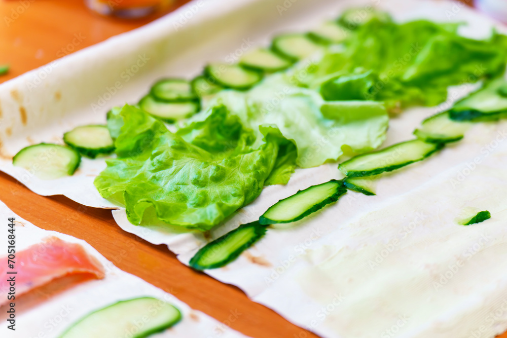 Preparation of a vegetarian snack with vegetables and pita bread Preparation of a vegetarian snack with vegetables and pita bread