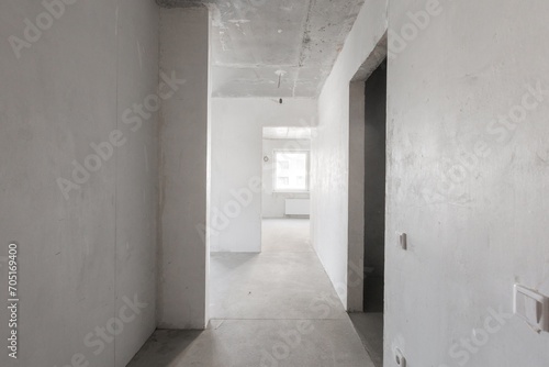 interior of the apartment without decoration in gray colors. rough finish