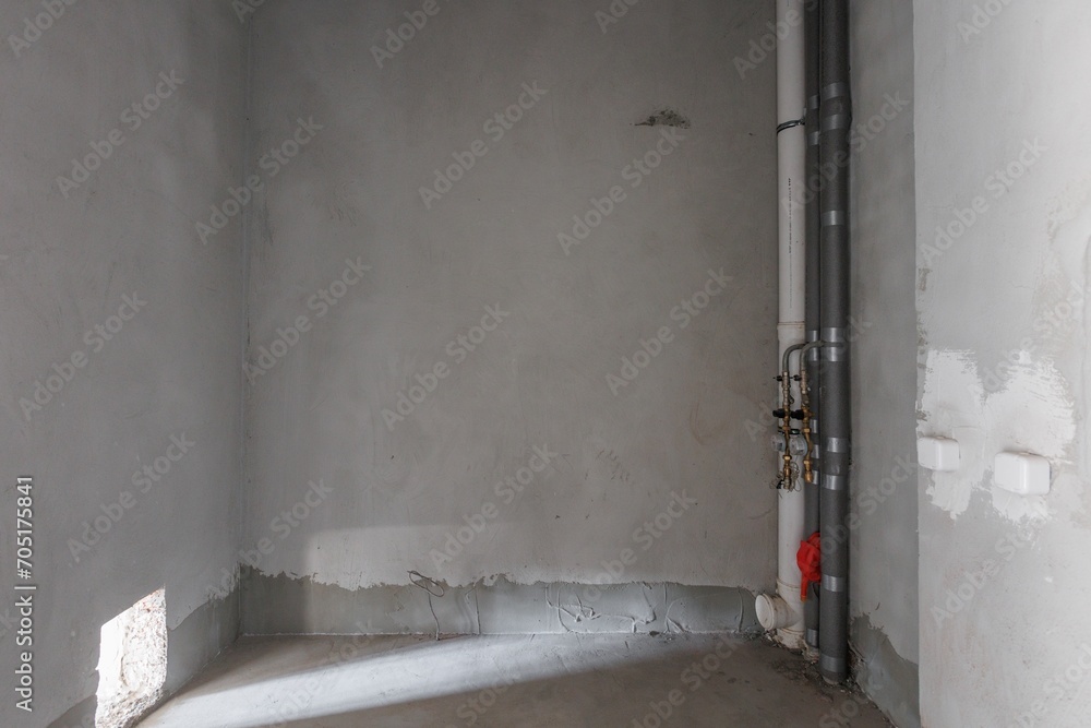 interior of the apartment without decoration in gray colors. rough finish interior of the apartment without decoration in gray colors. rough finish