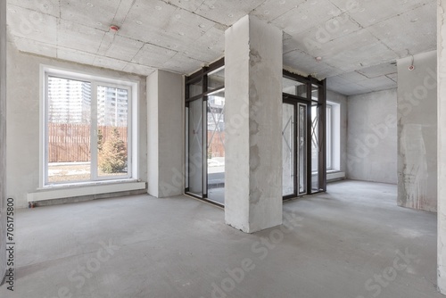 interior of the apartment without decoration in gray colors. rough finish