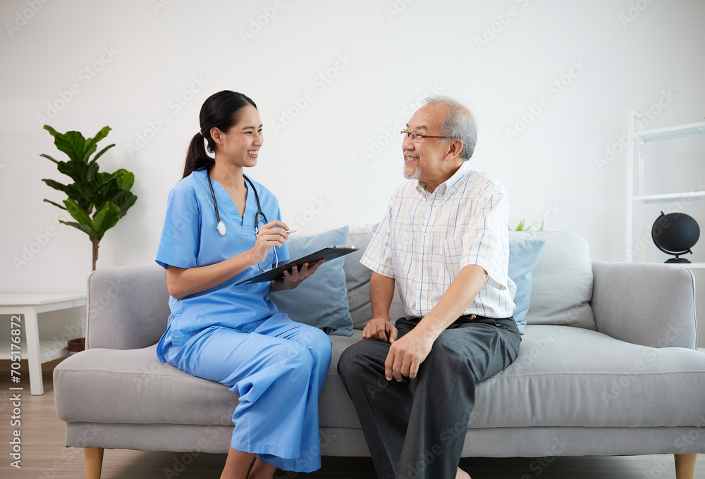 nurse or caregiver holding a clipboard meeting and talking about health with elderly man nurse or caregiver holding a clipboard meeting and talking about health with elderly man