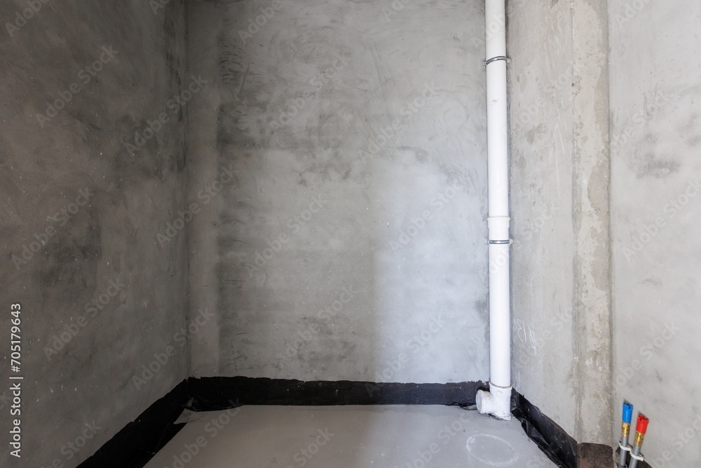 interior of the apartment without decoration in gray colors. rough finish interior of the apartment without decoration in gray colors. rough finish
