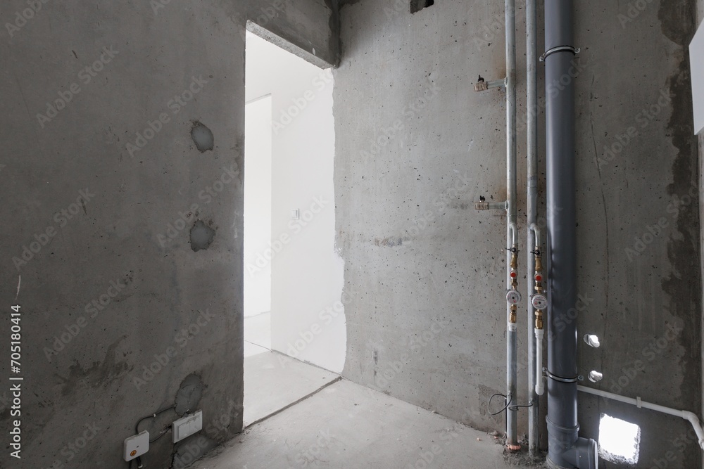 interior of the apartment without decoration in gray colors. rough finish interior of the apartment without decoration in gray colors. rough finish