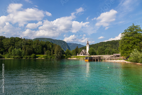 Lake Bohinj a large lake in Slovenia, is located in the Bohinj Valley of the Julian Alps, in the northwestern region of Upper Carniola, part of the Triglav National Park photo