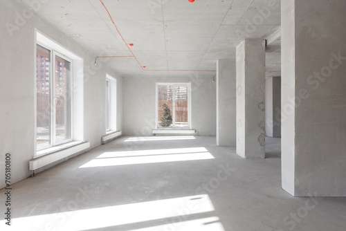 interior of the apartment without decoration in gray colors. rough finish