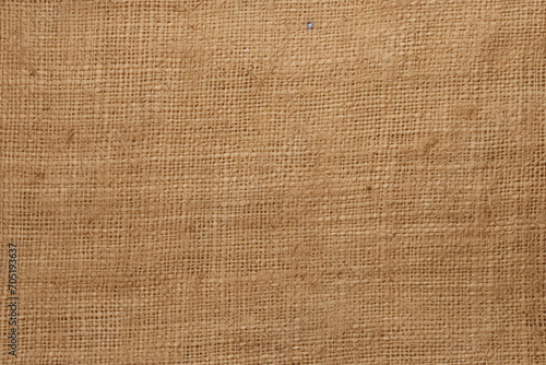 Rough burlap textile texture in natural tan color