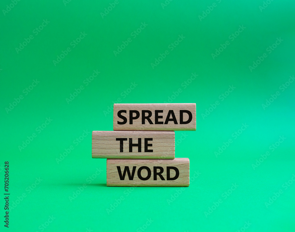 Spread the Word symbol. Concept words Spread the Word on wooden blocks. Beautiful green background. Business and Spread the Word concept. Copy space. Spread the Word symbol. Concept words Spread the Word on wooden blocks. Beautiful green background. Business and Spread the Word concept. Copy space.