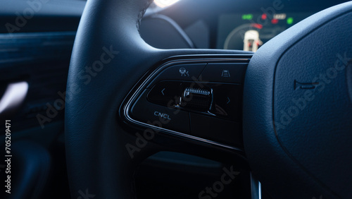 Car steering wheel cruise control switches photo
