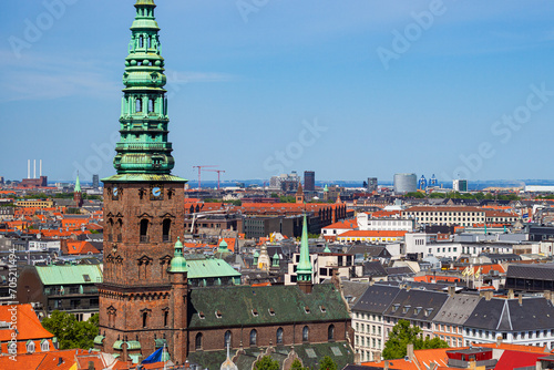 Nikolaj Kunsthal Contemporary Arts Centre, housed in former church of St Nicholas in the downtown of Copenhagen, Denmark. View from the tower of Christiansborg Slot Palace photo