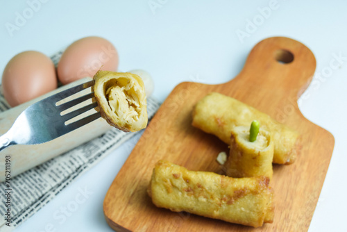 Risoles sosis mayo (American risoles) or mayonnaise sausage rissole is a small patty rolled in breadcrumbs. photo