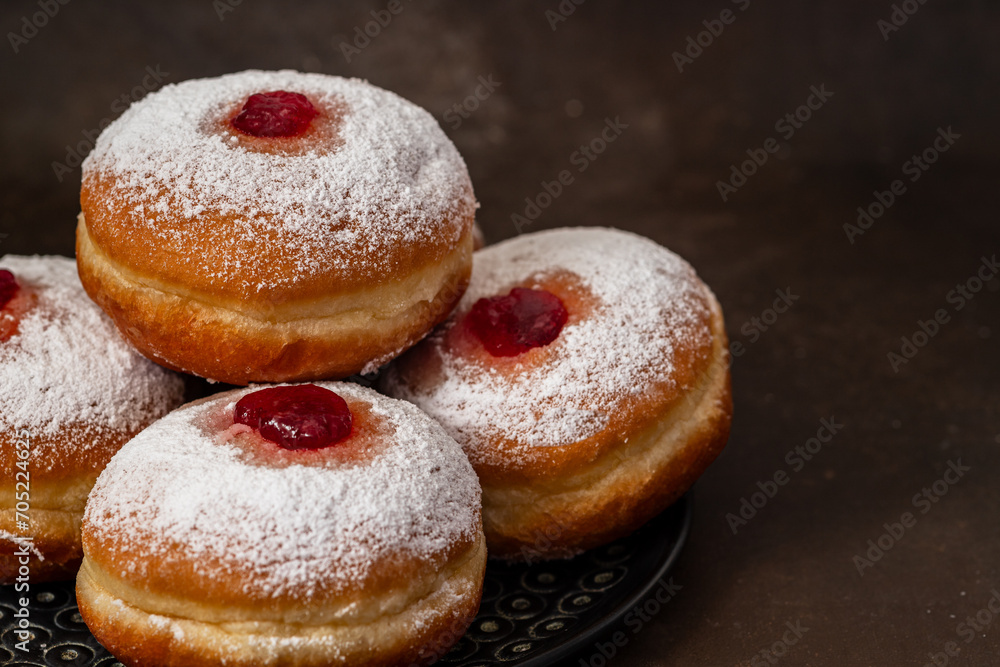 Jewish holiday hannukah symbols - donuts with jam	