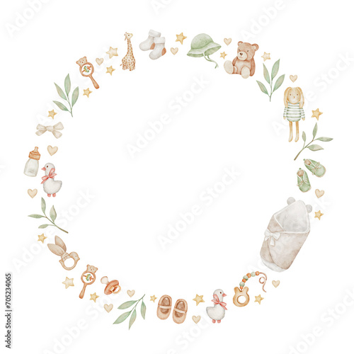 Cute watercolor wreath with baby clothes, toys and twigs, baby Shower Invitations. Children's accessories and toys are depicted around the crib.