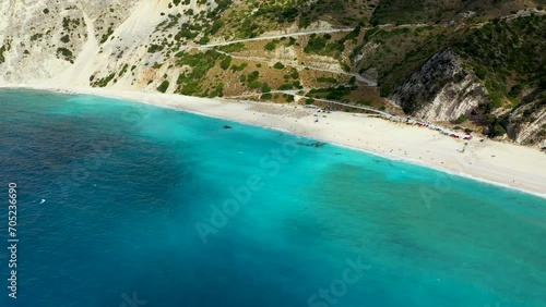 Aerial drone video of iconic turquoise and sapphire bay and beach of Myrtos, Kefalonia (Cephalonia) island, Ionian, Greece. Myrtos beach, Kefalonia island, Greece. Beautiful view of Myrtos beach. photo