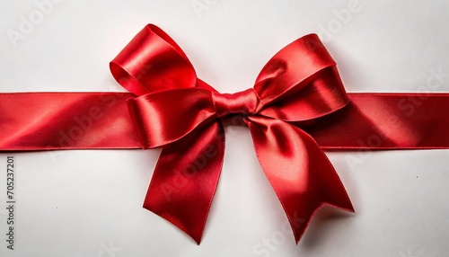 red satin ribbon and bow on white background