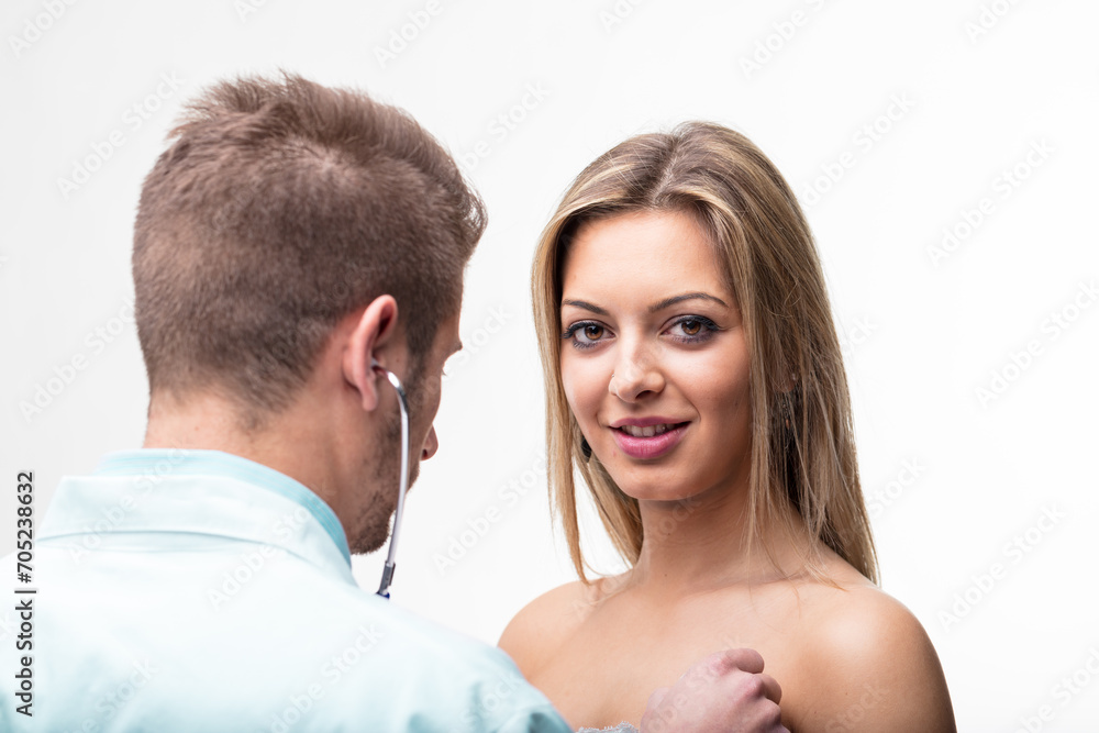 Health check, woman reassured by physician's expertise Health check, woman reassured by physician's expertise