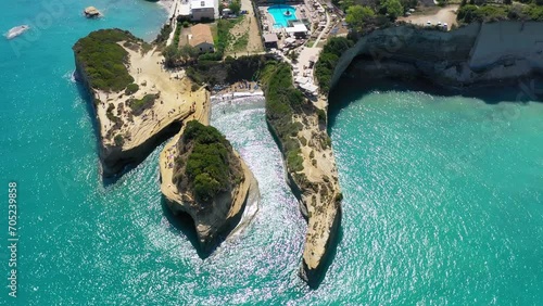 Famous Canal D'amour in Sidari, Corfu island, Greece. Famous Canal d'Amour beach with beautiful rocky coastline in amazing blue Ionian Sea in Sidari holiday village on Corfu island in Greece. photo