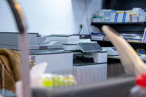 Quadro su tela Note Book Binding Machine  with printers in the background