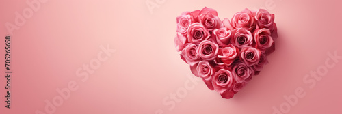 Bouquet of blossom red roses on pink background heart shaped with copy space  perfect greeting card for Valentine Day