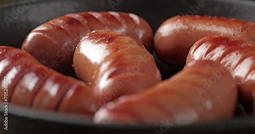 Close-up of fried sausages in a pan