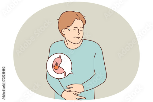 Unhealthy man suffer from stomach inflammation