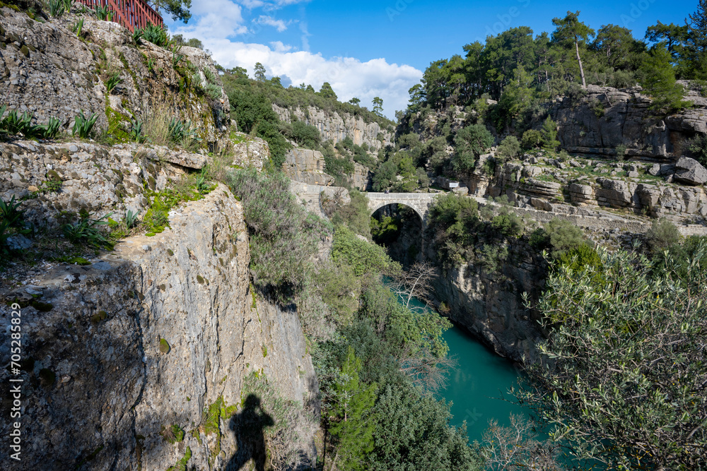 Transparent waters of Kopru River (Köprüçay, ancient Eurymedon) with its emerald green colour in Koprulu Canyon (Köprülü Kanyon) National Park, Antalya, Turkey. It's a rafting paradise Transparent waters of Kopru River (Köprüçay, ancient Eurymedon) with its emerald green colour in Koprulu Canyon (Köprülü Kanyon) National Park, Antalya, Turkey. It's a rafting paradise