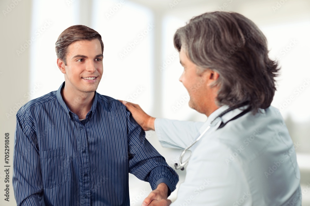 Smile doctor consulting patient in hospital for support. Smile doctor consulting patient in hospital for support.