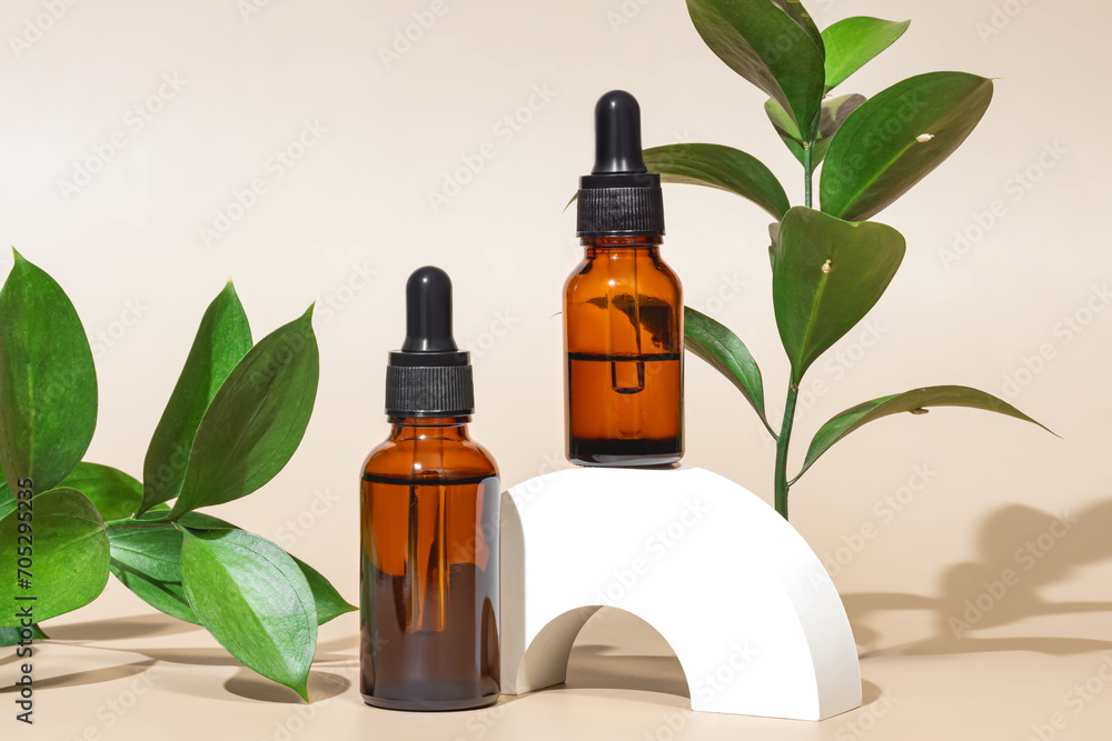 Essential Oil Bottles with Droppers on Modern Display Essential Oil Bottles with Droppers on Modern Display