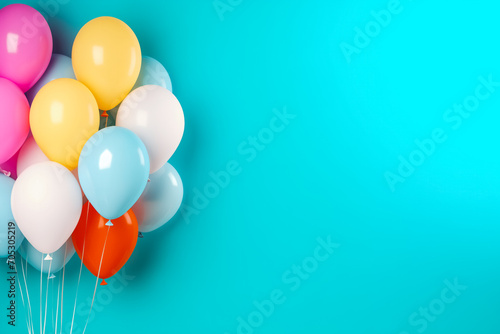 Bunch of bright balloons and space for text against color background.