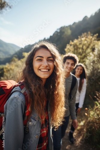Three friends hiking in the mountains