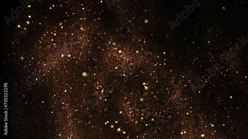 Super Slow Motion Shot of Festive Golden Glittering Background at 1000fps. photo