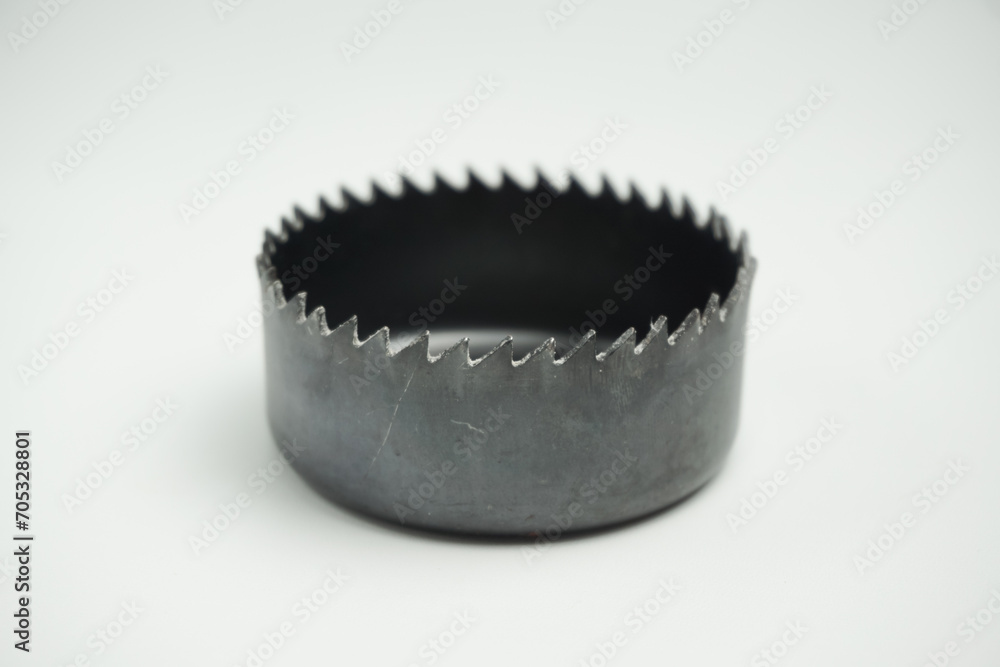 drill hole saw tools for making holes in pipes and wood isolated on white background drill hole saw tools for making holes in pipes and wood isolated on white background