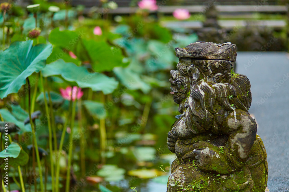 Sculpture of a temple with flowers and incense for ritual offerings on the popular tourist island of Bali. Sculpture of a temple with flowers and incense for ritual offerings on the popular tourist island of Bali.