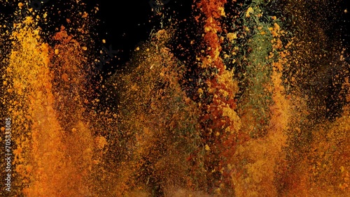 Super Slow Motion Shot of Colorful Explosion of Various Spices on Black Background at 1000fps. photo