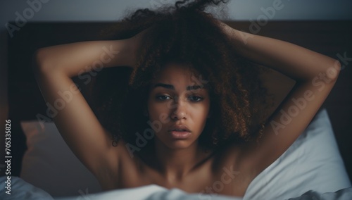 Portrait of a young woman with curly hair photo