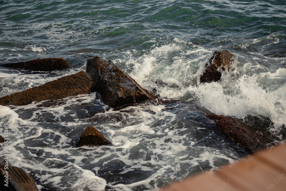 Naklejka premium Black Sea waves crashing onto rocks. Wavy sea ocean concept. Storm over the Black Sea.