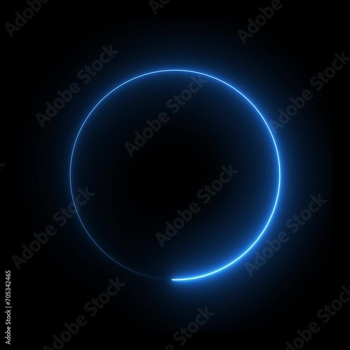 Bright thin neon blue circle in rotation swirling around glowing on a black background - looped -overlay isolated background