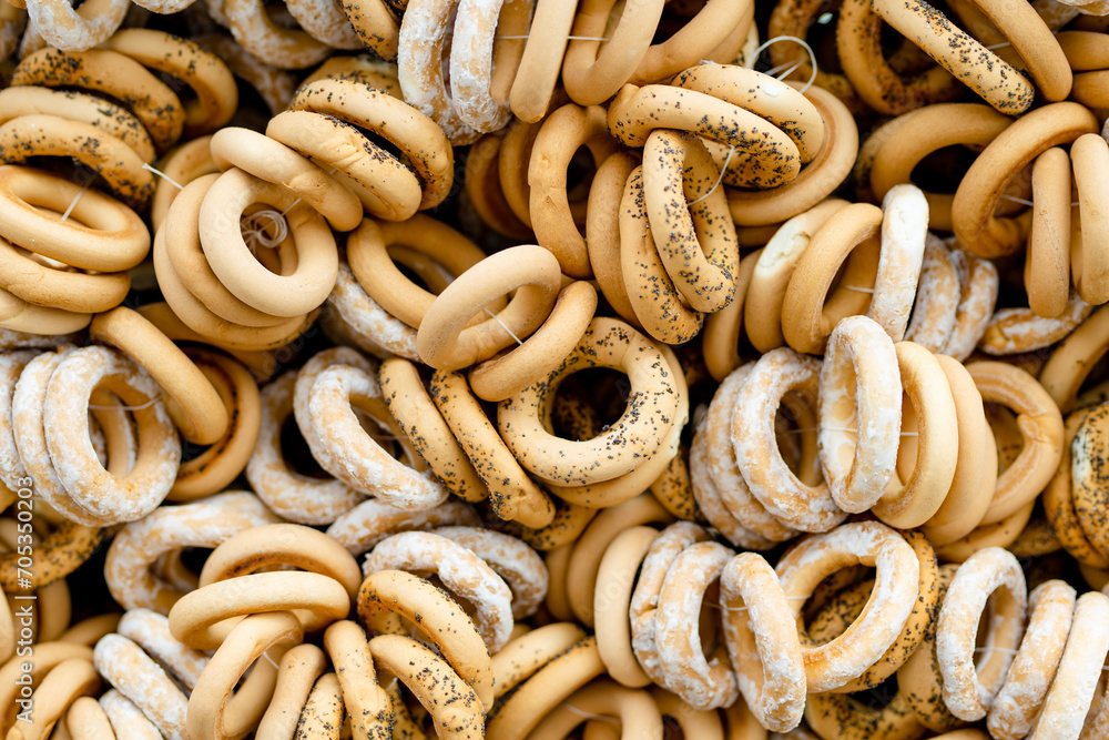 Loaves of organic bagels for sale at outdoor farmers market in Vilnius. Traditional spring fair in capital of Lithuania. Loaves of organic bagels for sale at outdoor farmers market in Vilnius. Traditional spring fair in capital of Lithuania.