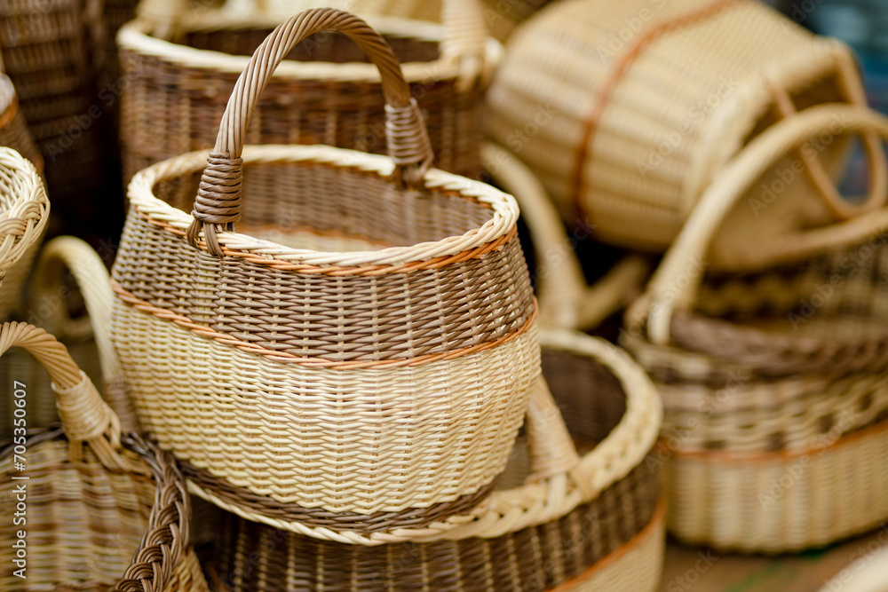 Wicker baskets of various sizes sold on Easter market in Vilnius. Annual spring fair on the streets of capital of Lithuania. Wicker baskets of various sizes sold on Easter market in Vilnius. Annual spring fair on the streets of capital of Lithuania.