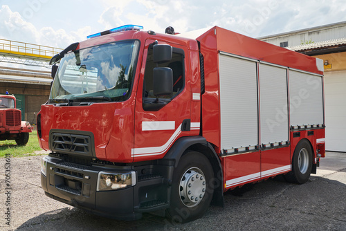 A state-of-the-art firetruck  equipped with advanced rescue technology  stands ready with its skilled firefighting team  prepared to intervene and respond rapidly to emergencies  ensuring the safety