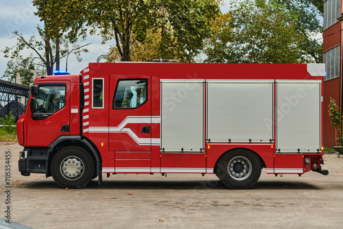 A state-of-the-art firetruck  equipped with advanced rescue technology  stands ready with its skilled firefighting team  prepared to intervene and respond rapidly to emergencies  ensuring the safety