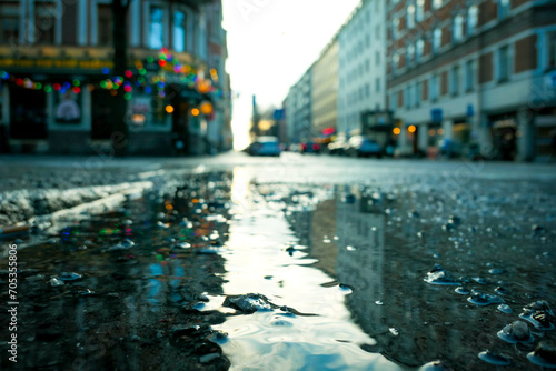 a close up of a rainy city street photo